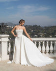 Front view of the Aurelia fitted lace wedding dress with two detachable train panels