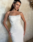Close-up of the Aveline fitted strapless wedding dress with dimensional floral lace appliqué