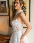 Close-up of the Celestia strapless lace A-line wedding dress with a sweetheart neckline and sheer corset bodice