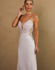 Elara fitted wedding dress with spaghetti straps, plunging neckline and illusion lace bodice at Swan Bridal San Antonio