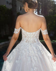 Back bodice detail of the Elaria lace ball gown with a low scoop back, covered buttons, and 3D floral appliqué