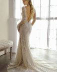 Isolde long sleeve lace wedding dress with open V-back and elegant bridal train