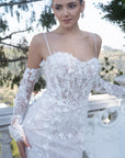 Close-up of the Seraphine 3D floral French lace fit-and-flare wedding dress with a sheer corset bodice and detachable off-the-shoulder sleeves