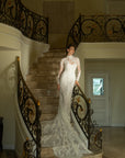 Full front view of the Valentina fit-and-flare wedding dress styled with a detachable long-sleeve French lace jacket