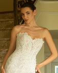 Front view of the Valentina strapless French lace fit-and-flare wedding dress with floral lace appliqué