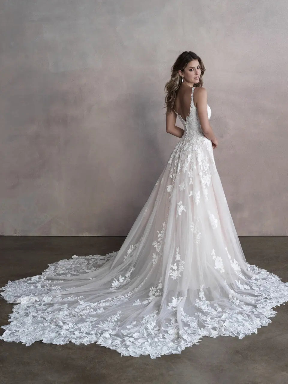 sample sale wedding dresses Fit and Flare Goddess Bridal Gown by Claire Pettibone featuring delicate lace adorned spaghetti straps Wedding dress sample sale |