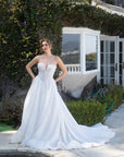 Front view of the Aurelia beaded French lace ball gown with a basque waist, full skirt, and flowing train
