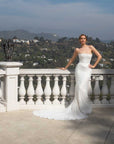 Front view of the Aurelia fitted strapless lace wedding dress without the detachable train panels