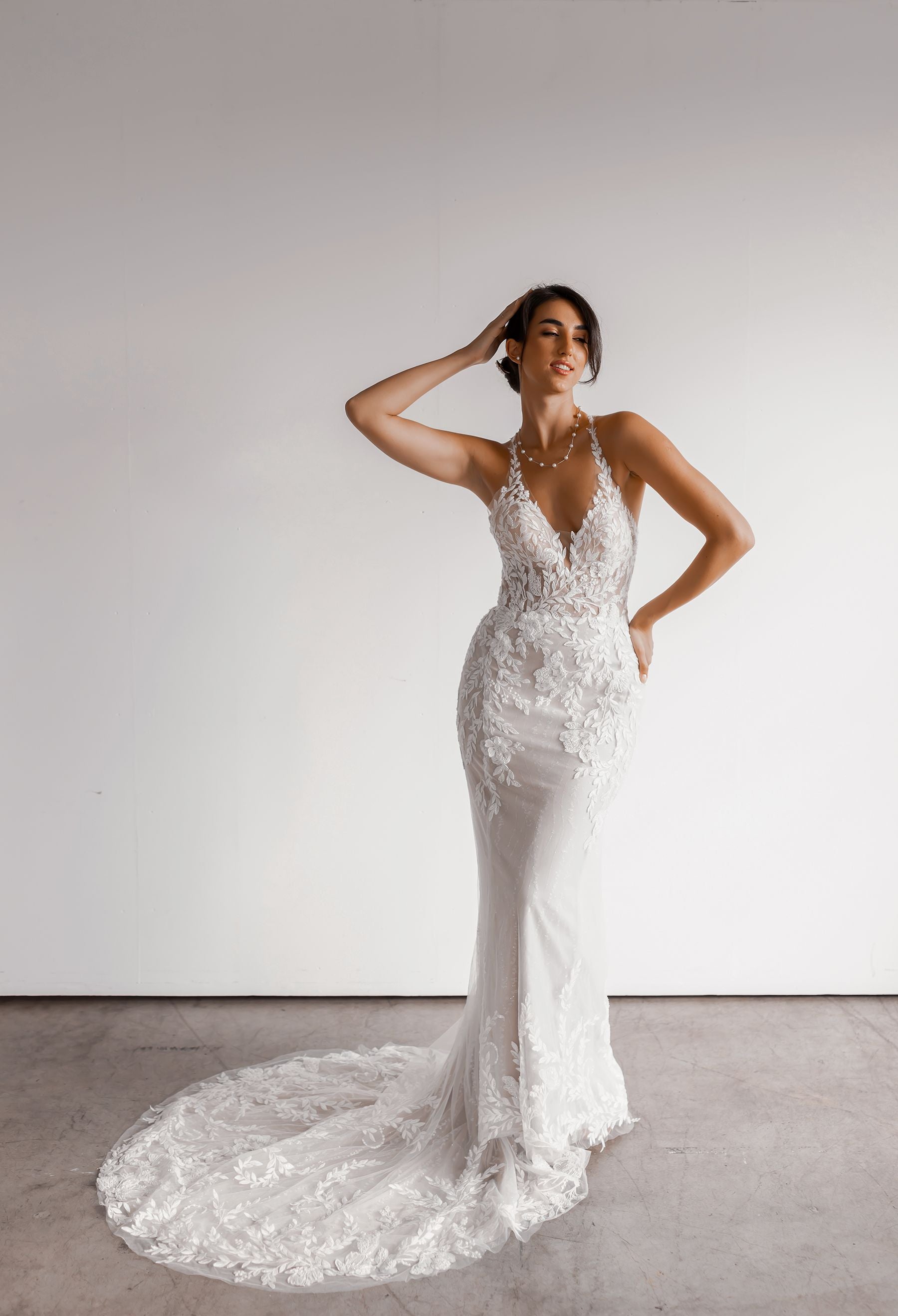 Aveline floral lace fit-and-flare wedding dress front view at Swan Bridal San Antonio