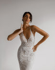 Aveline wedding dress with plunging V-neckline and floral lace appliqué bodice