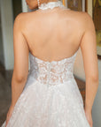 Back detail of the Celestia strapless lace A-line wedding dress with a low sheer corset bodice and floral lace