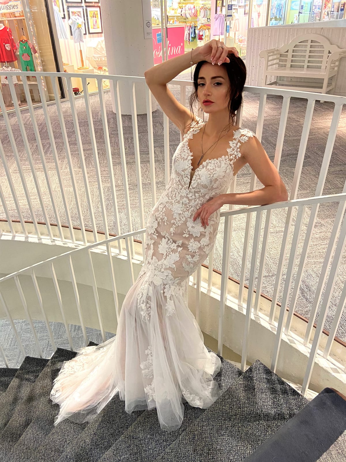 Amélie floral lace fit-and-flare wedding dress with plunging neckline and lace straps at Swan Bridal San Antonio.