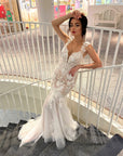 Amélie floral lace fit-and-flare wedding dress with plunging neckline and lace straps at Swan Bridal San Antonio.