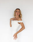 Lisette clean wedding gown with floral off-the-shoulder neckline detail
