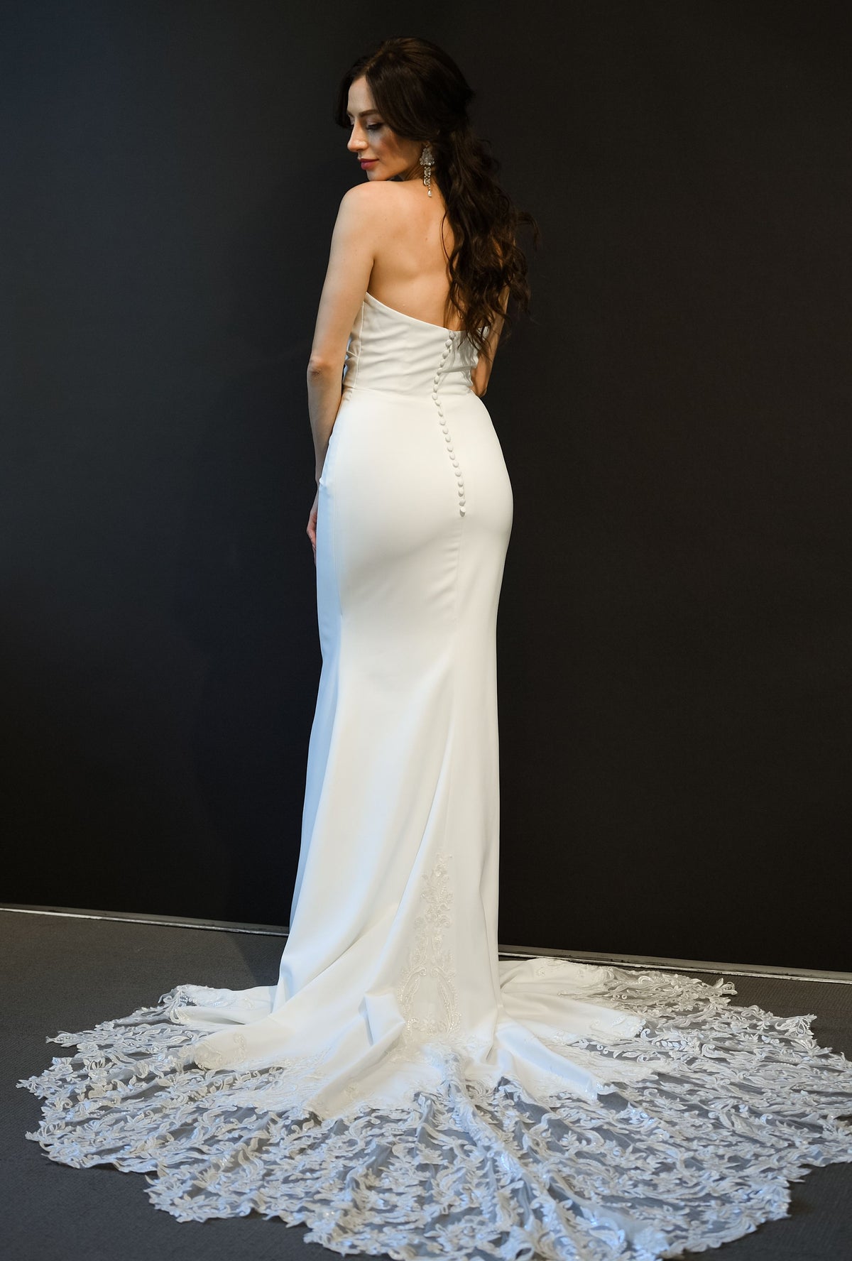 Odette fitted wedding gown with bridal button back and dramatic lace train