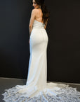 Odette fitted wedding gown with bridal button back and dramatic lace train