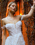 Rosalie floral lace wedding gown with sheer corset back and off-the-shoulder long sleeves