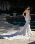 Full back view of the Seraphine 3D floral French lace fit-and-flare wedding dress with a low back and dramatic lace train