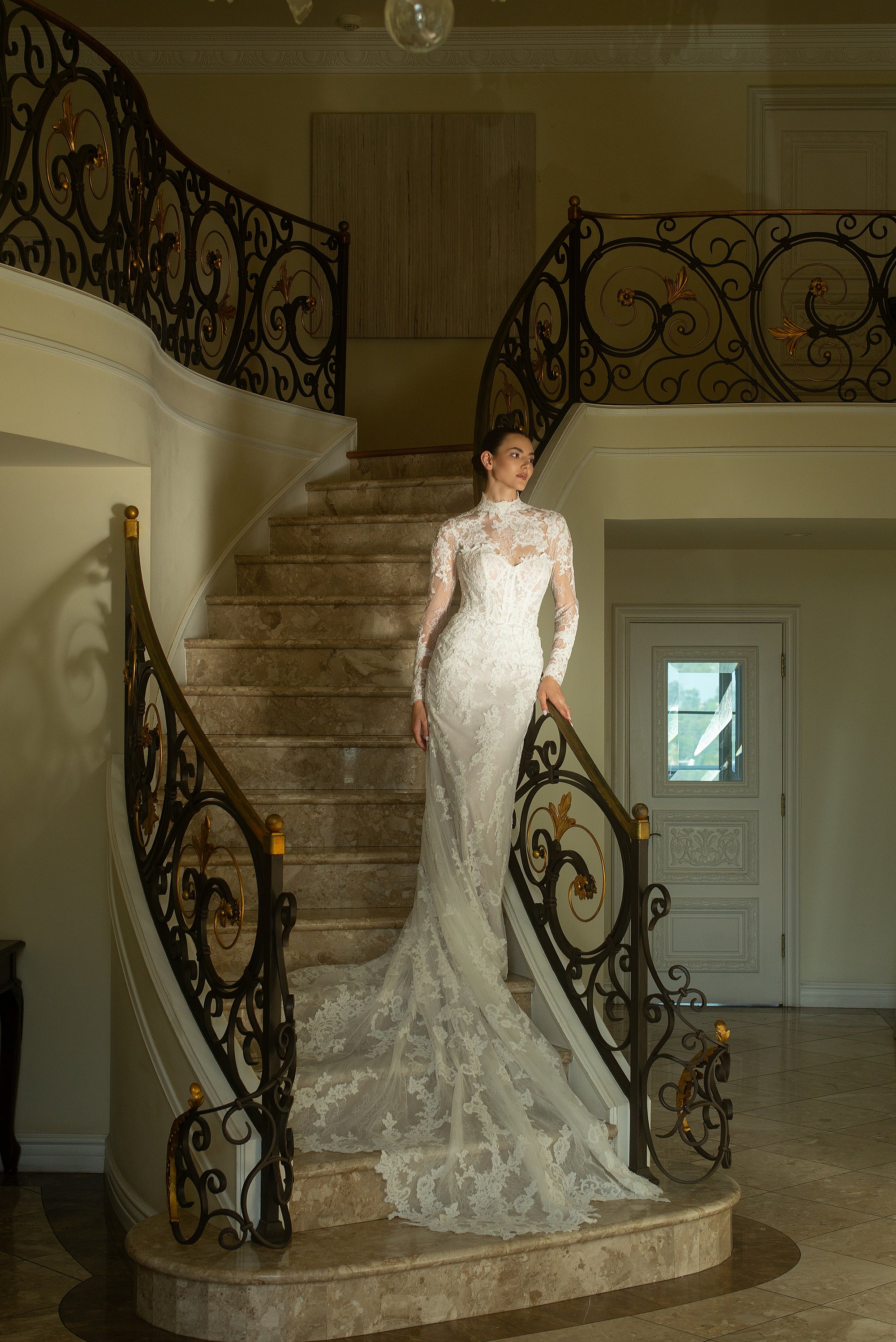 Full front view of the Valentina fit-and-flare wedding dress styled with a detachable long-sleeve French lace jacket