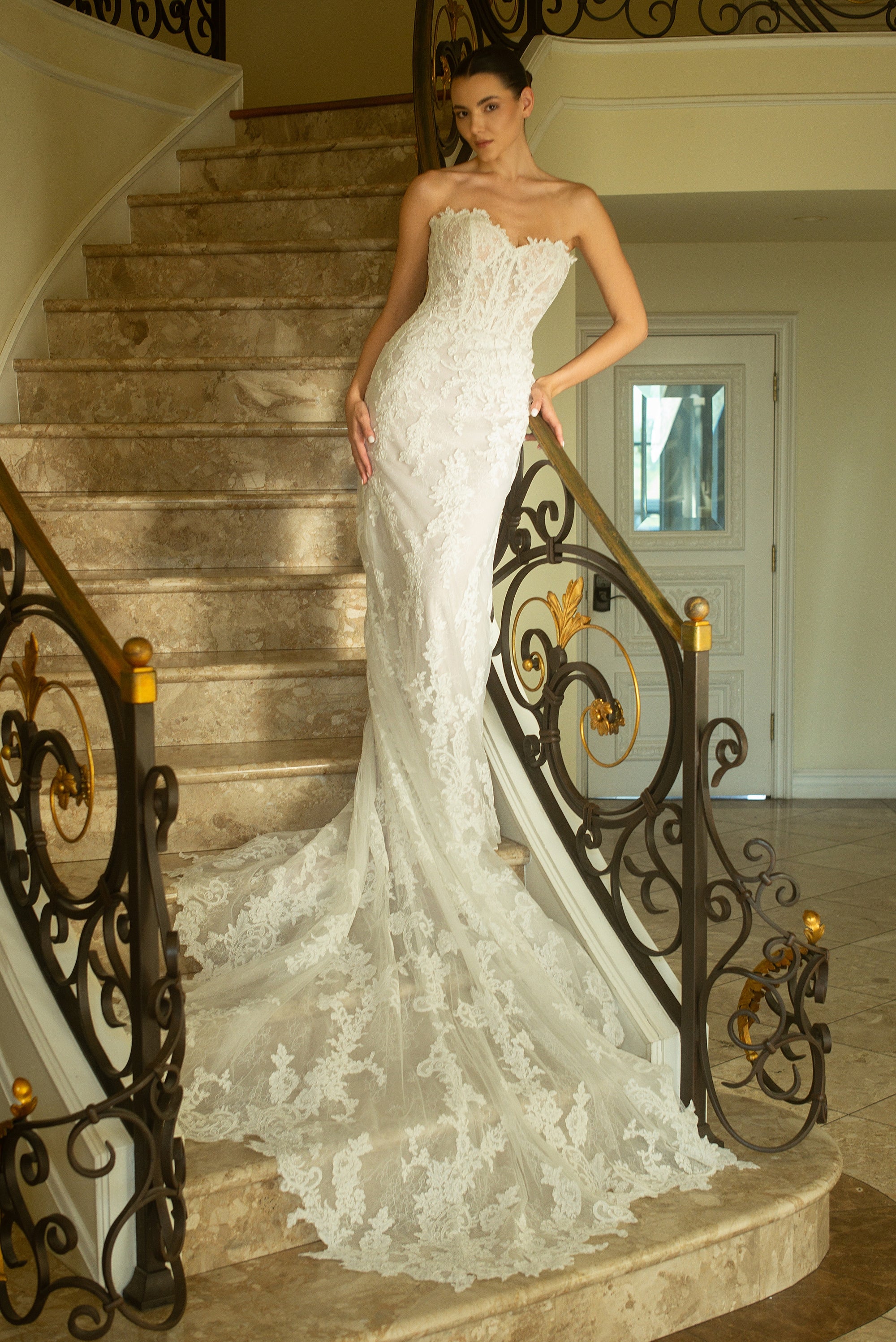 Front view of the Valentina strapless French lace fit-and-flare wedding dress with floral lace appliqué